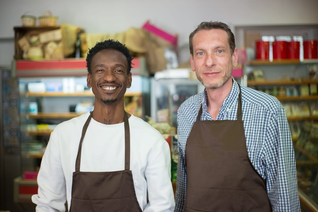 A small founding team at work behind a Sydney café counter